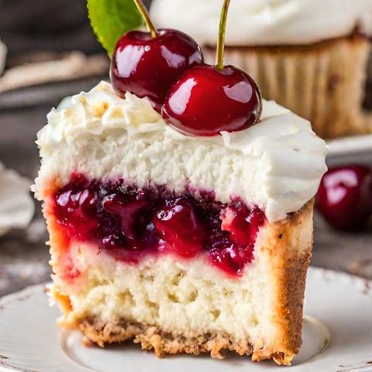 In the realm of baked goods, a standout creation mesmerizes with its fusion of flavors and textures. The Heavenly Cherry Almond Cupcake is this creation's name,