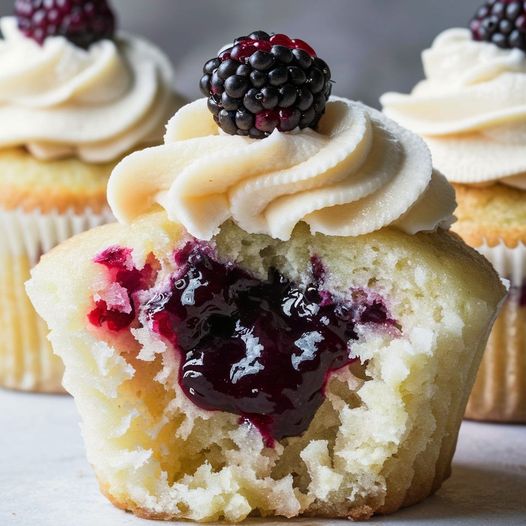 Vanilla Cupcakes with a Hidden Blackberry Jam Center